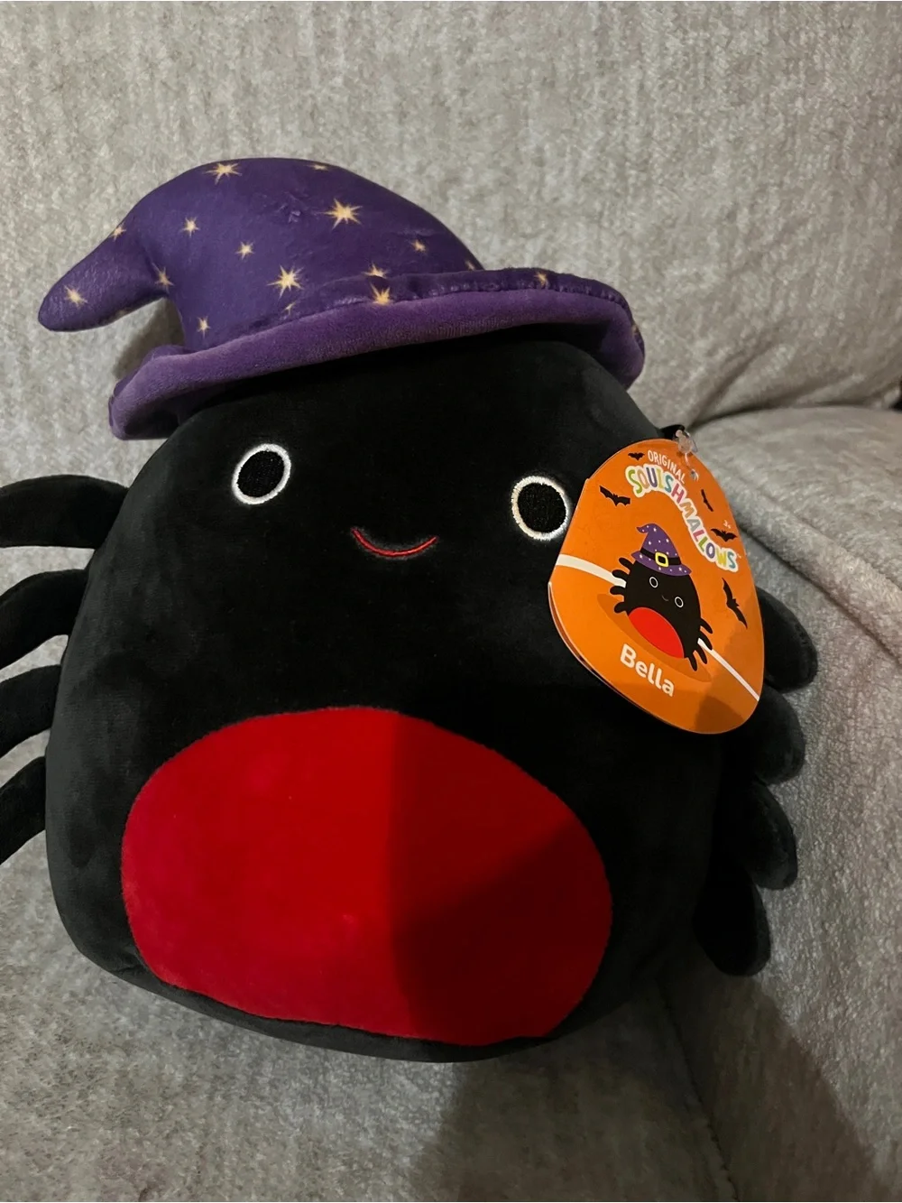 Squishmallows Bella Black Spider Plush with Purple Star Hat and Red Belly